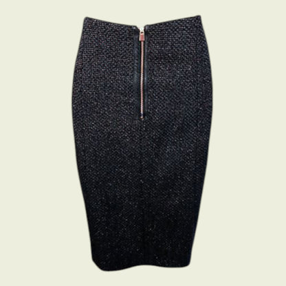 Navy textured pencil skirt with a zipper on a beige background