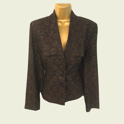 Plum patterned blazer on a mannequin against a light background