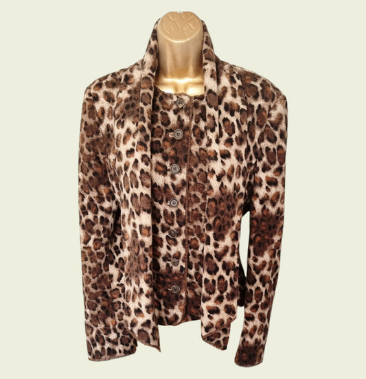 Leopard print jacket on a mannequin against a beige background