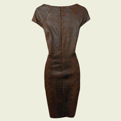 Brown leather dress with a subtle pattern on a beige background