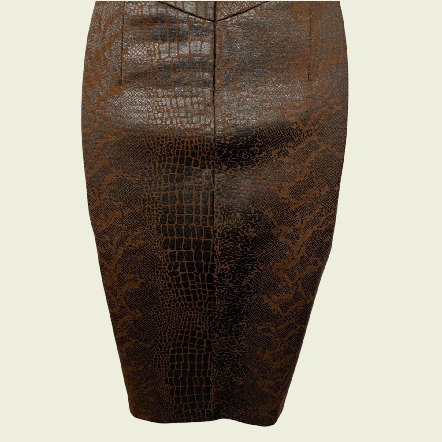 Brown patterned pencil skirt on a beige background