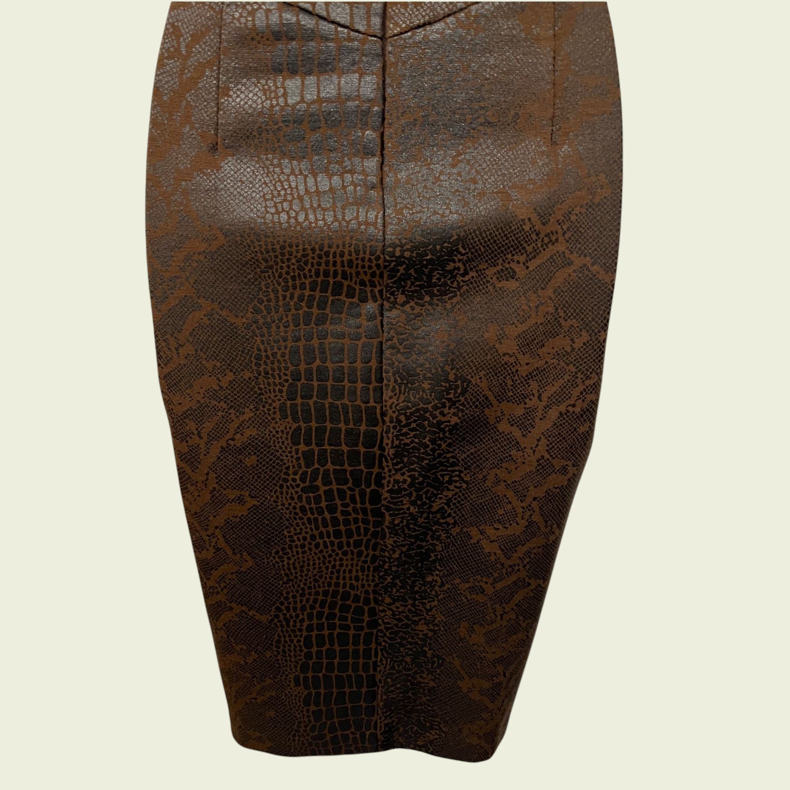 Brown patterned pencil skirt on a beige background