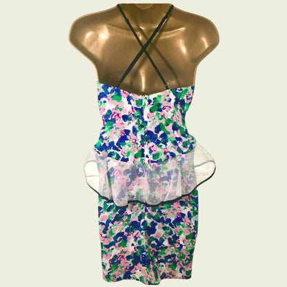 Floral dress on a mannequin with a white background