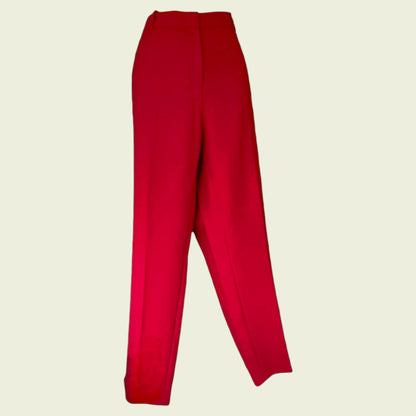 Red pants on a beige background