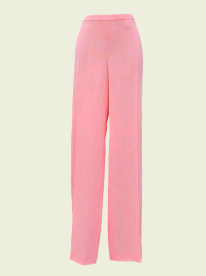 Pink pants on a beige background