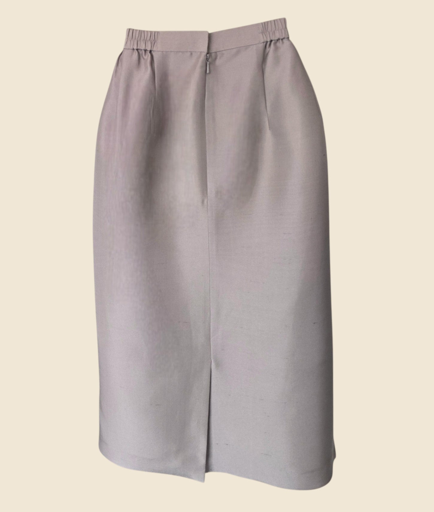 Gray skirt on a beige background