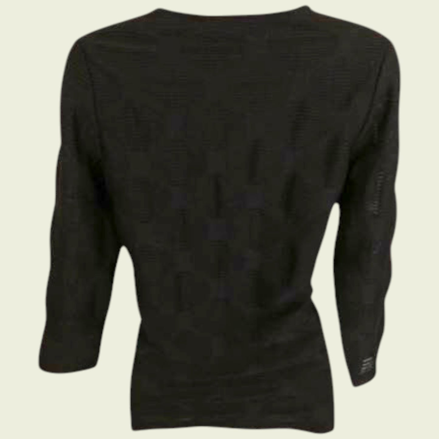 Mannequin wearing a navy top against a plain background