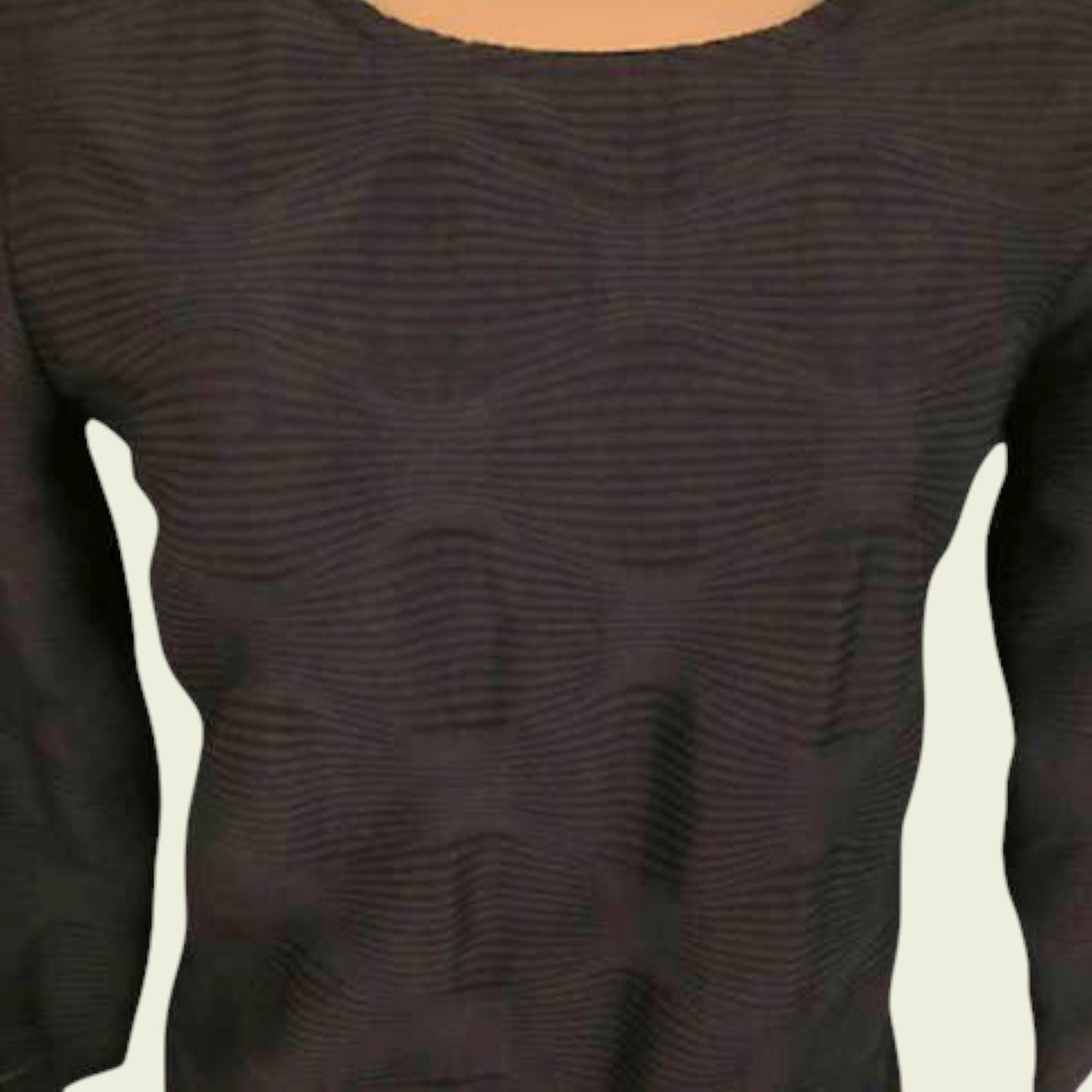 Close-up of a textured navy long-sleeve top on a neutral background