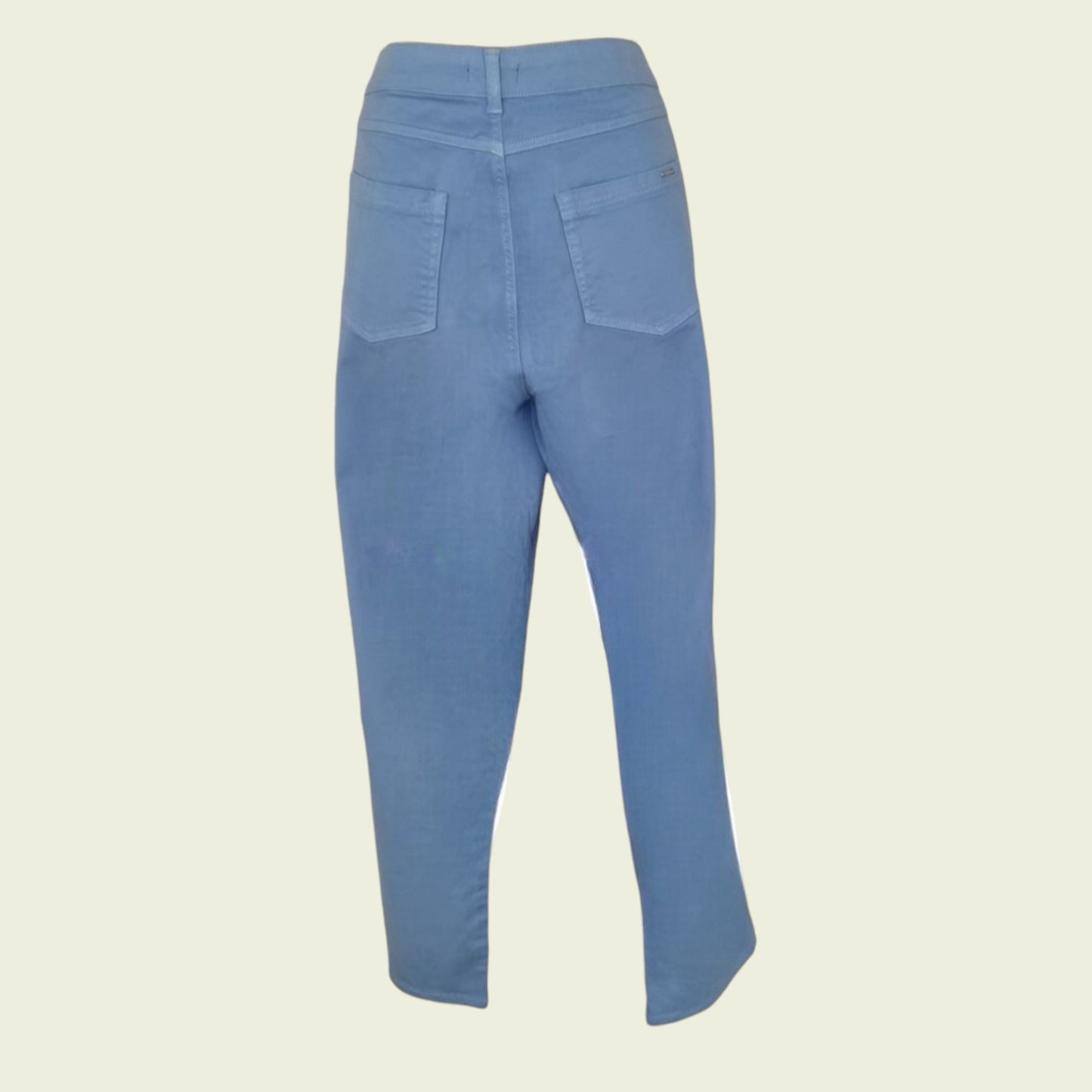 Blue pants on a beige background