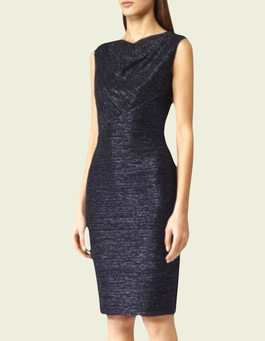 Navy blue dress worn by a model on a light beige background