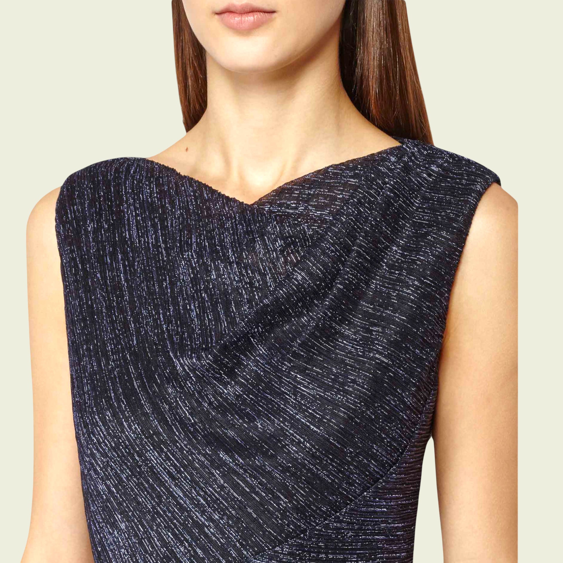 Navy blue textured dress worn by a model on a light beige background