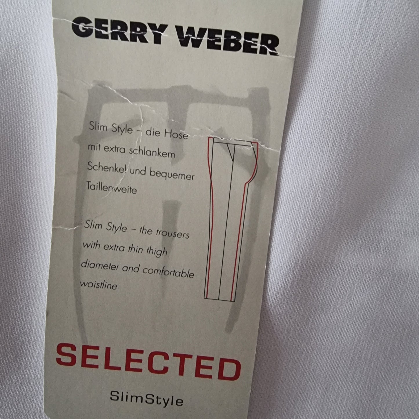 Gerry Weber label on a white garment with text and a diagram of pants.