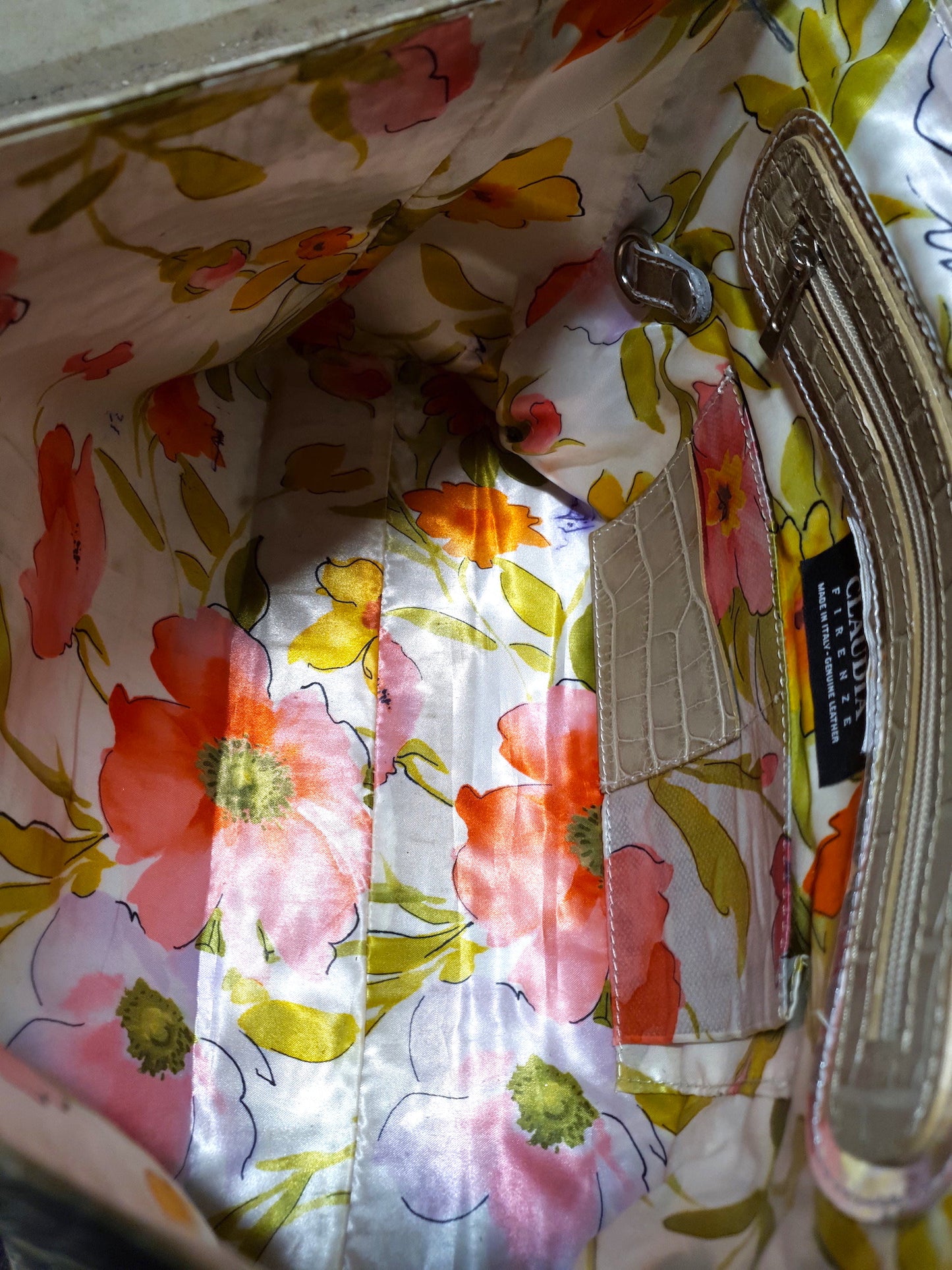 Floral-patterned fabric with a visible zipper
