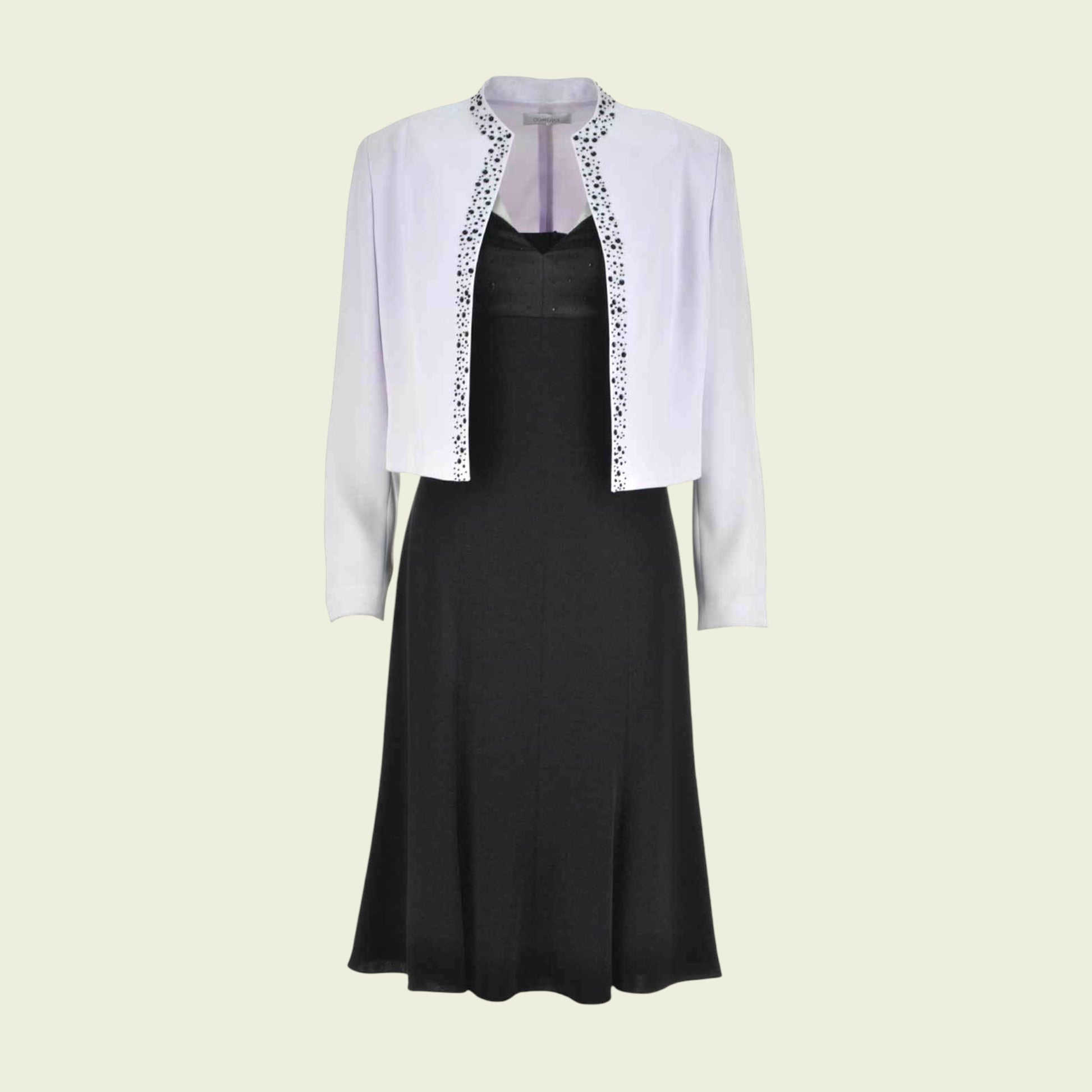 Llilac jacket and a black dress on a light beige background