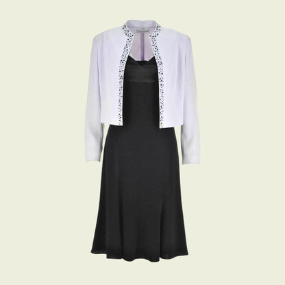 Llilac jacket and a black dress on a light beige background