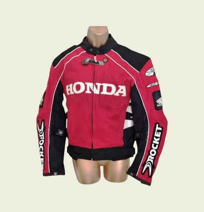 Red and black motorcycle jacket with Honda branding on a mannequin against a beige background