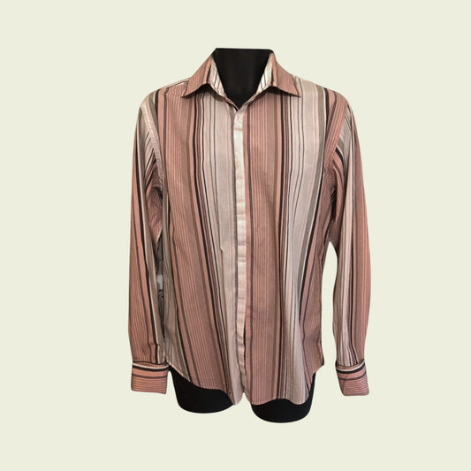 Striped shirt on a mannequin against a beige background