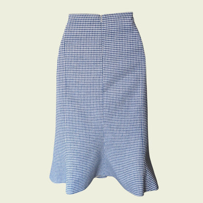 Blue and white checkered skirt on a beige background