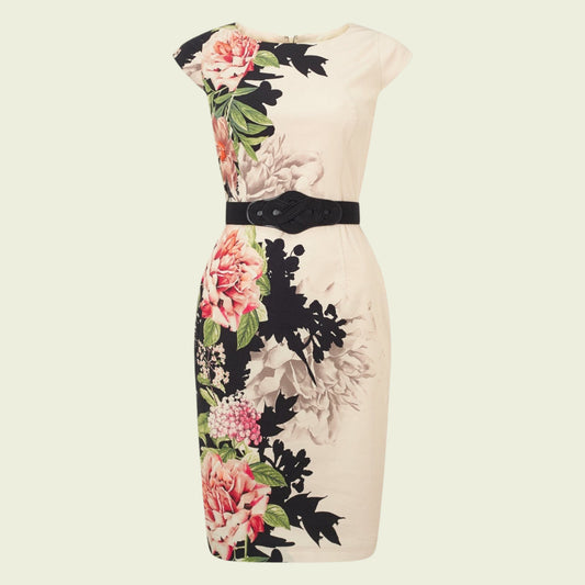 Floral dress with a belt on a beige background