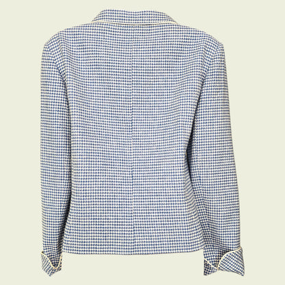 Blue and white checkered jacket on a beige background