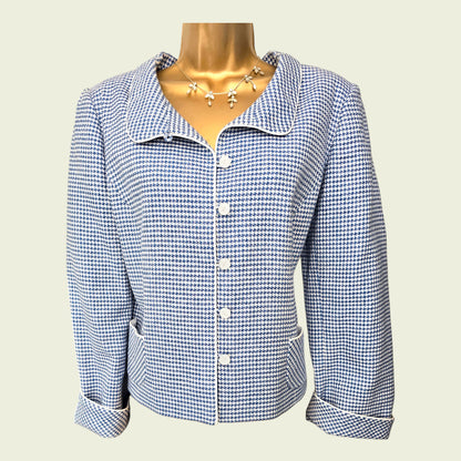 Blue and white checkered jacket on a mannequin against a light background