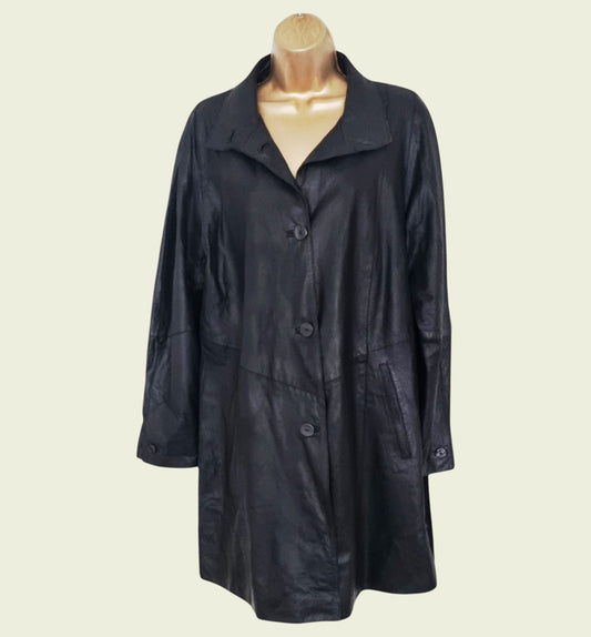 Black coat on a mannequin against a white background
