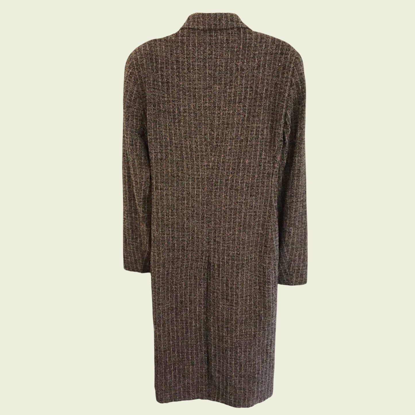 Brown checkered coat on a beige background