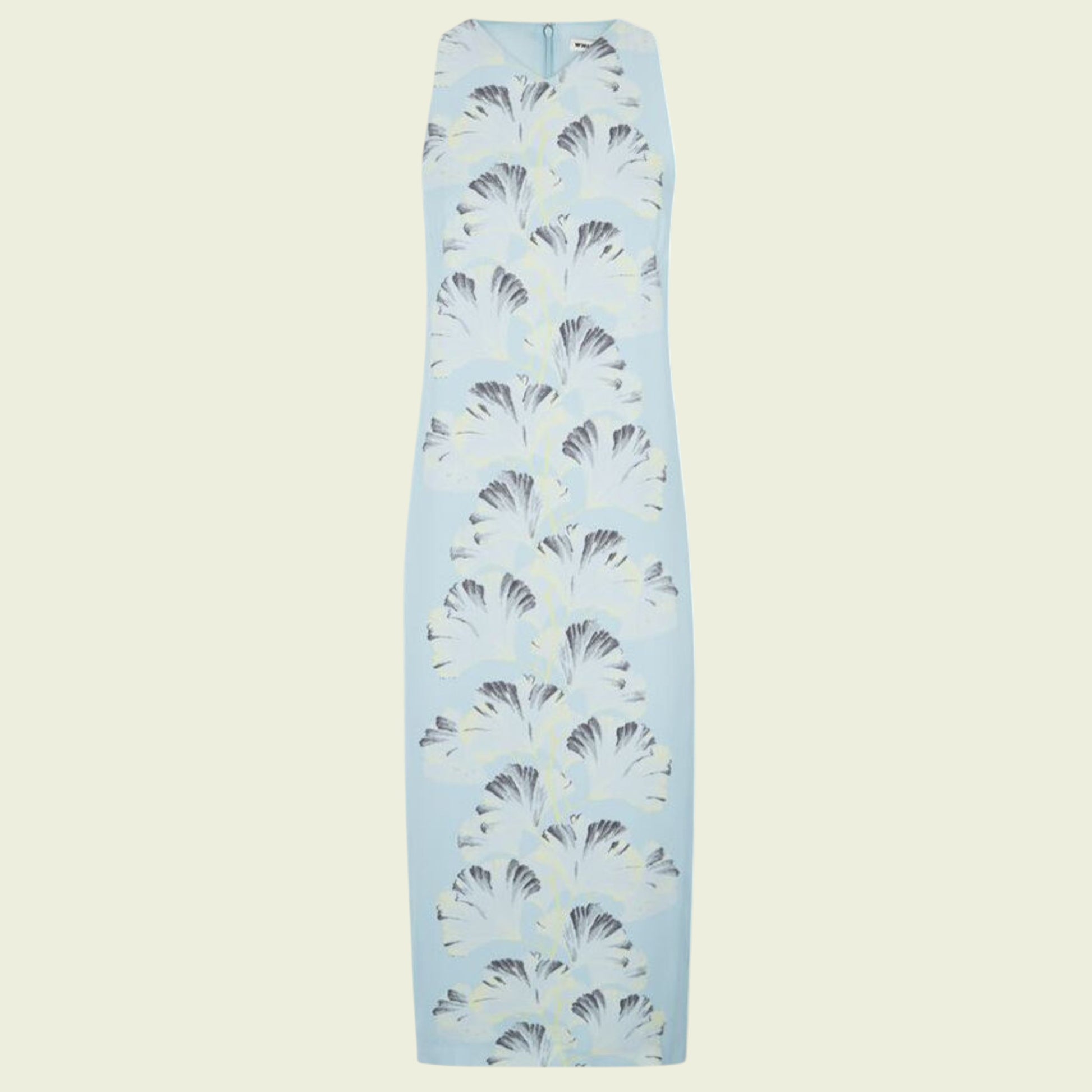 Light blue dress with black and white pattern on a beige background