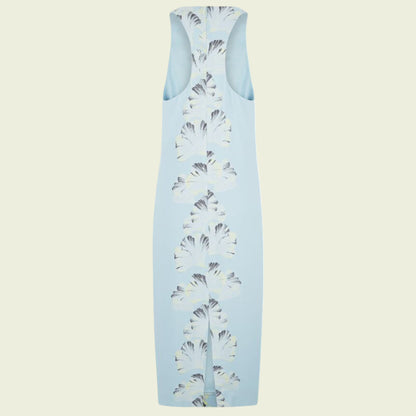 Light blue dress with floral pattern on a beige background