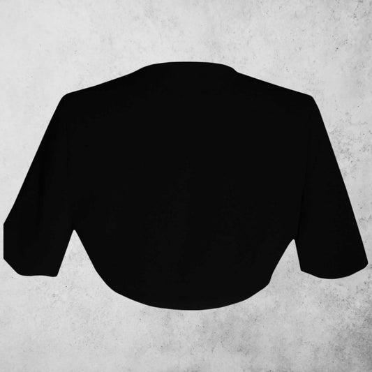 Black cropped jacket on a textured gray background