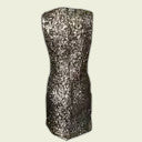 Black and white patterned dress on a beige background