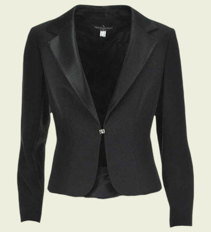 Black blazer on a beige background