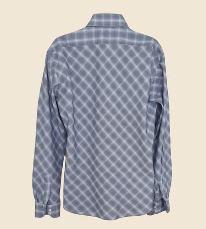 Blue checkered shirt on a beige background