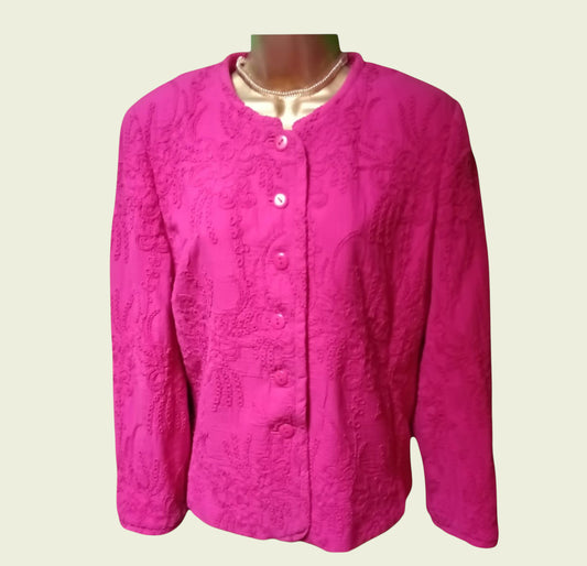 Pink textured jacket on a mannequin against a white background