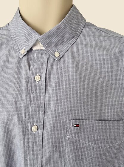 Blue checkered shirt on a mannequin with a visible brand logo.