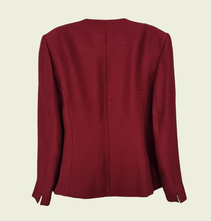 Maroon blazer on a beige background